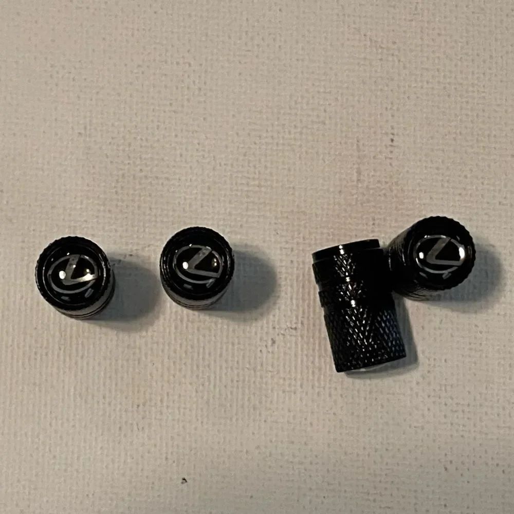 Lexus logo valve Stem caps in Black set of 4. NWT